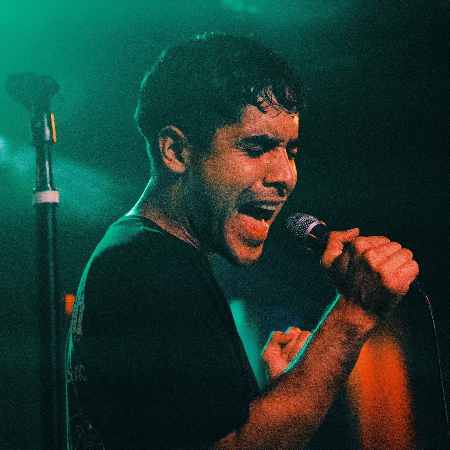 Neon Indian on stage, photographed by Joey Guzzino